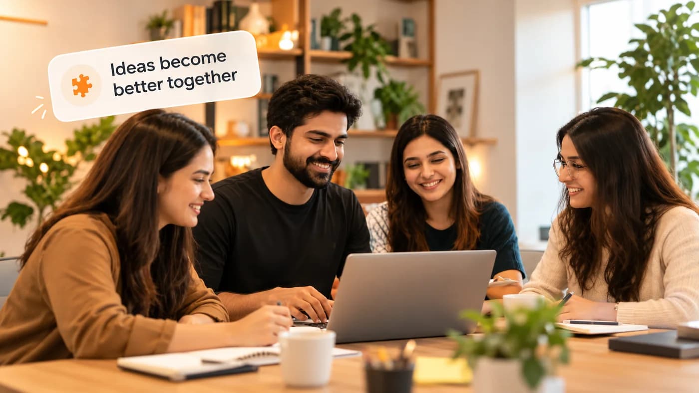 The VectrixLab team gathered around a laptop, sharing ideas